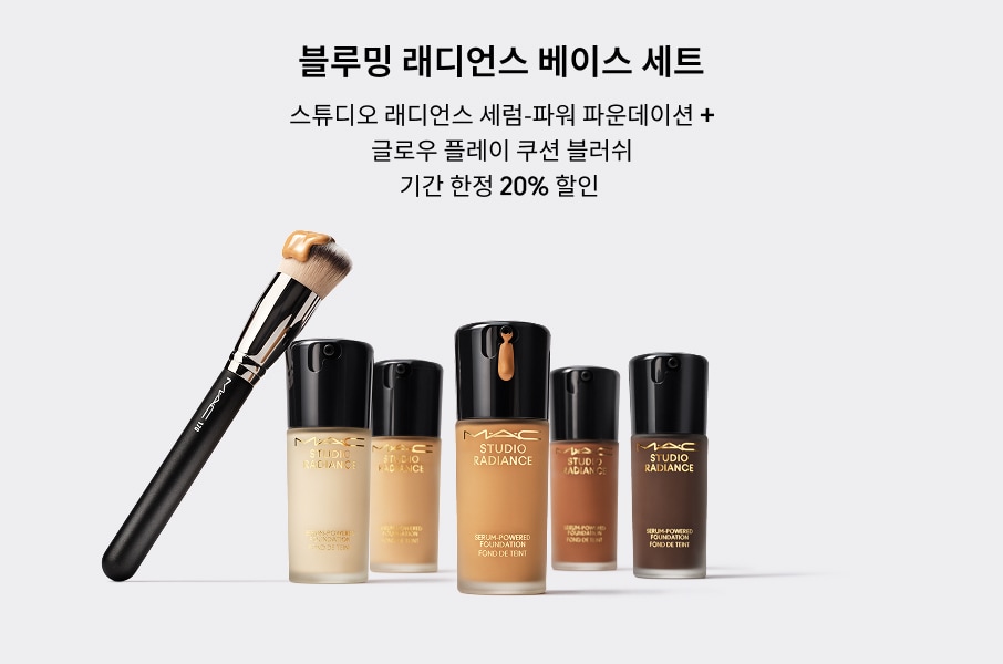 Closeup of model applying our iconic Velvet Teddy Matte Lipstick