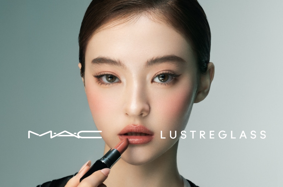 Closeup of model applying our iconic Velvet Teddy Matte Lipstick